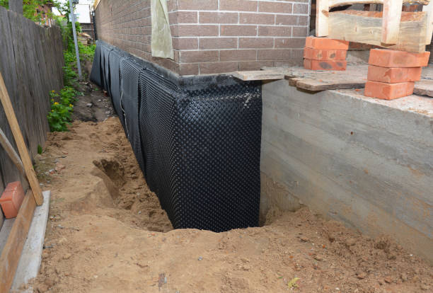 Happy homeowners after waterproofing job in Sunbury